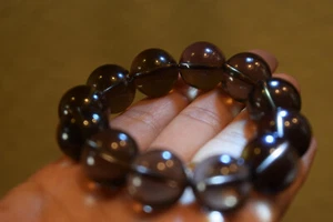 crystal bracelet unisex, new, brown or dark gray, elastic band - Picture 1 of 6