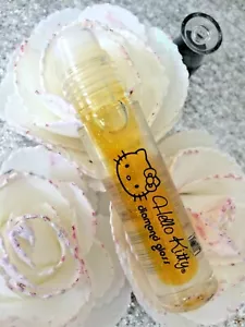 HELLO KITTY DIAMOND GLOSS AU FRUIT ROLLON LEVRES TRANSPARENT pailleté CITRON - Imagen 1 de 2