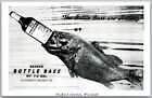HEAFFORD JUNCTION WI FISHING EXAGGERATED VINTAGE REAL PHOTO PC RPPC BOTTLE BASS