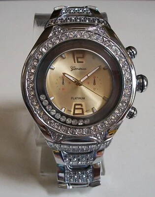 Reloj de moda de lujo flotante brillante con esfera dorada acabado plateado para hombre Foto 1 de 4