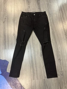 Pantalones de mezclilla Serenede para hombre 34 negros ajustados desgastados rasgados elásticos ajustados de diseñador - Imagen 1 de 5