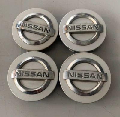JUEGO DE 4 TAPAS CENTRALES NISSAN MAXIMA ALTIMA SENTRA ROGUE 40342-AU510 USADAS OEM Foto 1 de 4