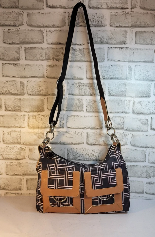 Bolso Bandolera LeSportsac Blanco y Negro Forro Amarillo Geométrico 13" Foto 1 de 4