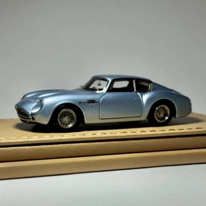 DMH Aston Martin DB4 Zagato 1:64 Light Ice Blue Ltd. 199 No Make Up Bbr Mr scm - Foto 1 di 8