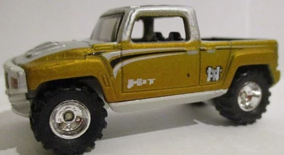 Hot Wheels Hummer H3T (Treasure Hunt) Goldloose escala 1/64 Foto 1 de 4