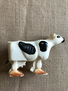 Vintage 1960s hard plastic cow ramp walker toy stamped Hong Kong