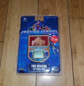 Justice League: The Rescue portátil LCD juego Techno Source 2005 sellado 1K DC  - Imagen 1 de 2