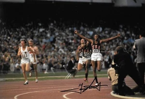 tommie smith arms raised after winning 200m final MEXICO CITY signed 12x8 photo - Picture 1 of 4