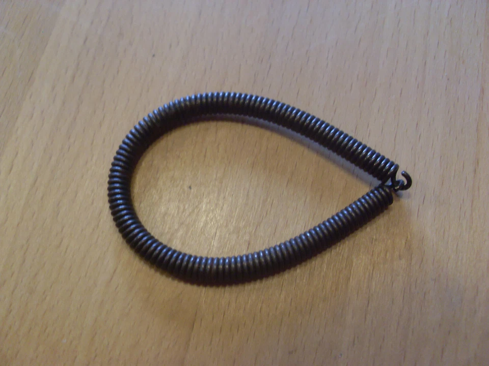 Original Clutch Spring dolmar 101 Poulan Micro ( Xxv) (101184010) - Image 1 of 1