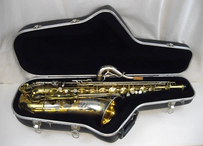SAXOFÓN TENOR PROFESIONAL KING SUPER 20 "SILVER SONIC" CUELLO ESTERLINA E INCRUSTACIONES DE ORO CAMPANA Foto 1 de 4