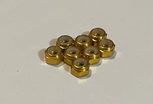 Tuercas Nyloc de aluminio dorado HSP 102048 3 mm 8 piezas 02091 1/10 coche de RC - Imagen 1 de 12
