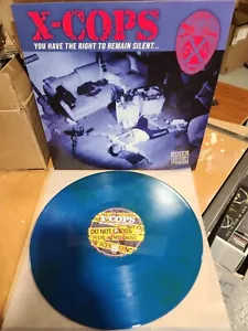 X-Cops-You Have the Right to Remain...Turquoise Vinyl (1 copy exists) GWAR - Foto 1 di 2