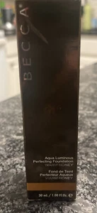 Becca Aqua Luminous Perfecting Foundation Dark Golden 1oz - NEW IN BOX AUTHENTIC - Picture 1 of 2