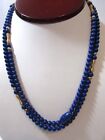 NAVY BLUE AND GOLD TONE ACCENT SPRING COIL ROUND BEADS LONG PLASTIC NECKLACE