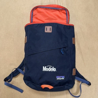 Mochila para portátil Patagonia X Modelo Toromiro Pack 22L azul y naranja, promoción Foto 1 de 4