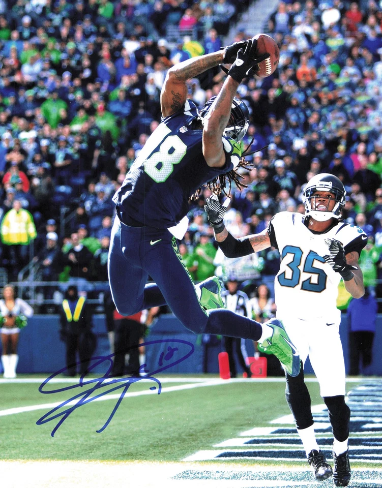 Foto firmada autografiada por Sidney Rice 11x14 Seattle Seahawks SKU #243983 Foto 1 de 1