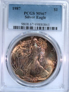 1987 US Silver American Eagle PCGS MS67 🔥COPPER & BRONZE TONING✨ - Picture 1 of 4