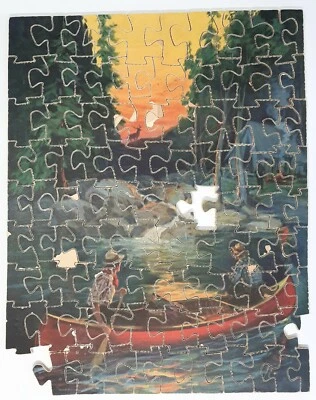 VINTAGE JIGSAW PUZZLE 2 MEN IN CANOE W/ DEER IN SUNSET CAMPING 3 PLY VENEER WOOD - Image 1 of 4