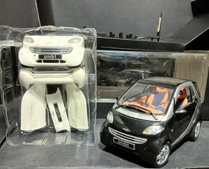 Modellino Smart City Coupé Jack Black + Lite White Ufficiale Maisto scala 1:18 - Foto 1 di 13