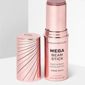 Revolution Glow Mega Beam Stick Evidenziatore Viso e Corpo Oro Rosa 0,63 oz - Foto 1 di 2