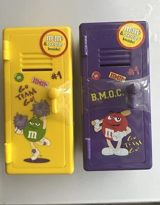 BANCO CASILLERO ESCOLAR M&M, AMARILLO Y MORADO  Foto 1 de 2