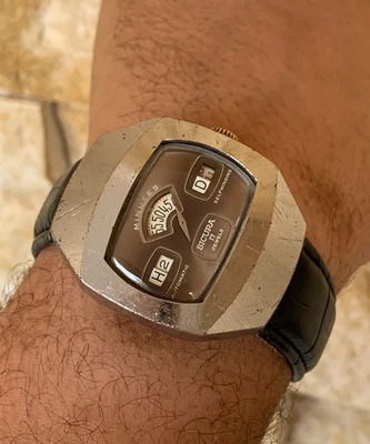 Reloj disco Sicura Jump Hour vintage años 70 suizo automático 17J 38 mm era espacial marrón Foto 1 de 4