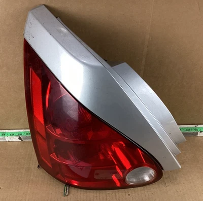2004-2008 Nissan Maxima Rear Left Driver Side Tail Light 26525-7Y025 OEM - Image 1 of 4