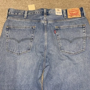 Levis 550 Jeans Mens 38x29 Blue Relaxed Fit Distressed Denim Waterless Cambodia - Picture 1 of 6