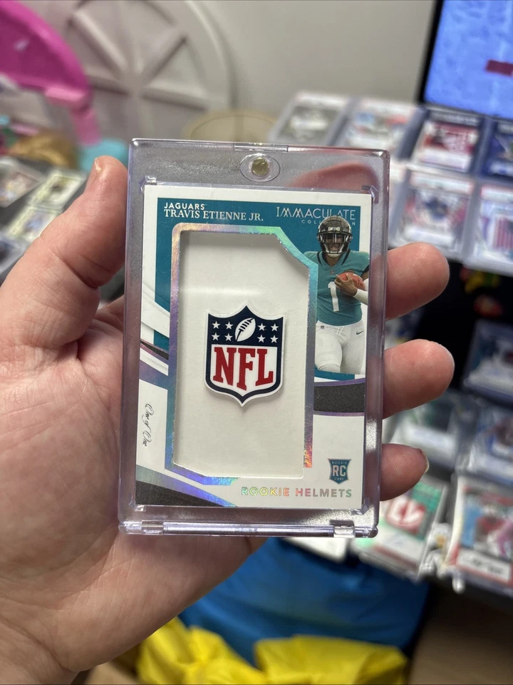 2021 Panini Immaculate Travis Etienne Jr. Rookie Helmets NFL Shield 1/1 RC - Image 1 of 4