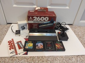 Atari 2600 Jr Console Complete In Box with 4 games.   All fully tested.