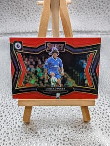 2024-25 Panini Select Premier League - Field Level Didier Drogba #249 Red Prizm - Bild 1 von 2