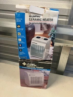 PAR de calentadores de disco LifeTime Pelonis/del-rain portátiles 1500 vatios Foto 1 de 3