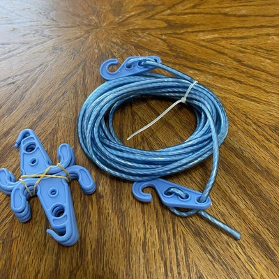 Línea de lavado 8 ganchos colgantes y clavijas a prueba de viento para ropa de 16,4 pies ropa asegurada Foto 1 de 4