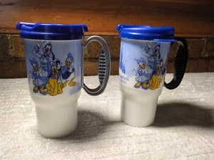Juego de 2 tazas de viaje Walt Disney World Cups Blue Whirley recuerdo - Imagen 1 de 7