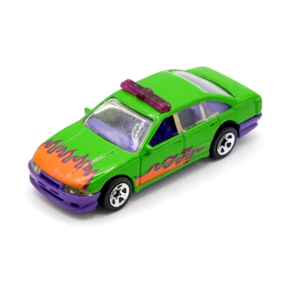 Coche de policía Hot Wheels Holden Commodore 1989 llamas verdes diecast vintage Foto 1 de 4