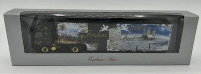 HERPA HO SCALE-2001 LTD RUN CHRISTMAS DAF TRACTOR/TRLR  “FROHES (HAPPY) FEST” - Image 1 of 4