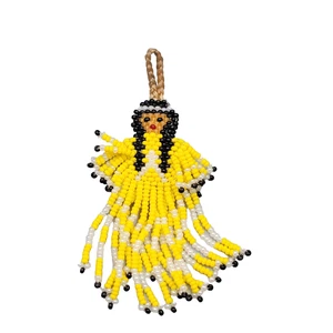 Vintage Südwesten Indianer Mädchen gelb Kleid Samen Perlen Anhänger Sehne 3,5" - Bild 1 von 6