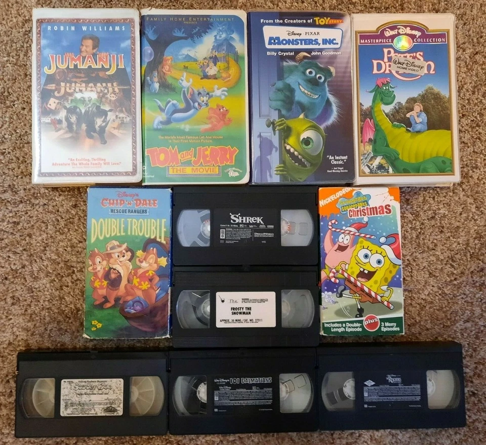 Lot of 11 Children's VHS Movies-Shrek/Jumanji/Monsters/Spongebob/Rescuers/Frosty - Image 1 of 1