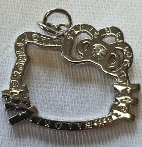 Pendentif HELLO Kitty couleur argent métal à identifier petit brillant - Foto 1 di 3