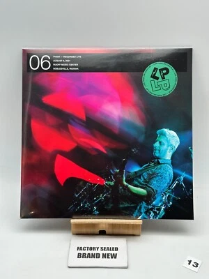 Phish – LP on LP 06: "Simple" / "Blaze On" 8/6/21 Orange with Black Swirl New - Image 1 of 3