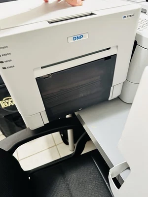 DNP DSRX1SH Sublimation Photo Printer with extras case and carry On - Image 1 of 4