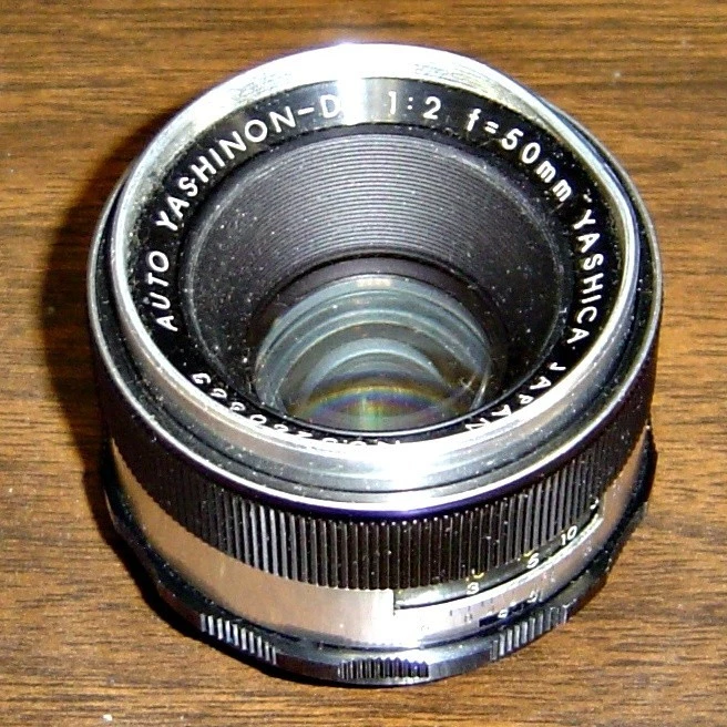 Vintage Yashica Auto YASHINON - DX 1:2  f= 50mm 35mm SLR Lens: Free shipping. - Image 1 of 1