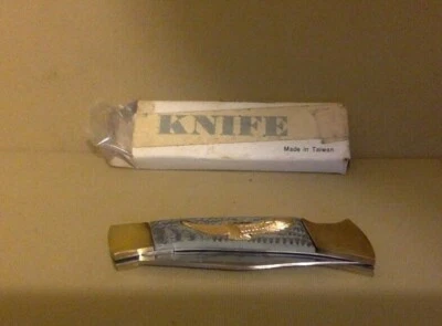 Cuchillo vintage. Cuchillo de caza con funda. Hoja de 4". Águila dorada. Sin usar, en caja Foto 1 de 4