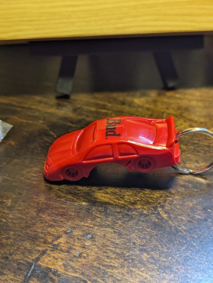Budweiser NASCAR Red BUD Car Keychain Bottle Opener Beer Vintage NEW/UNUSED  - Image 1 of 4