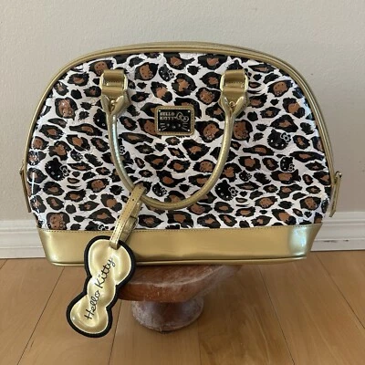 Bolso grande dorado Sanrio Hello Kitty con cúpula de leopardo en relieve/forma de bolos Foto 1 de 4
