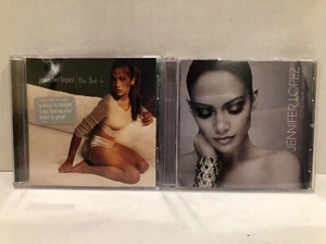 Jennifer Lopez: On The 6 and Como Ama Una Mujer, Lot of 2 CDs - Imagen 1 de 4