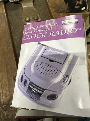 Radio reloj batería más pequeña del mundo de por vida con auriculares Foto 1 de 4