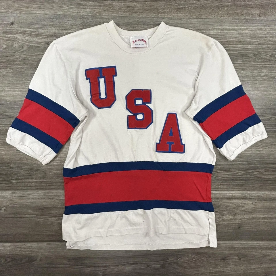 Camiseta deportiva de hockey vintage del equipo de EE. UU. para hombre grande hecha en EE. UU. Nutmeg Mills años 80 EE. UU. Foto 1 de 4
