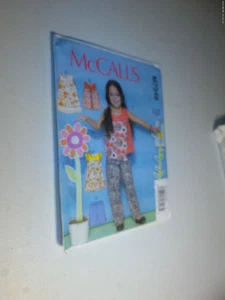 McCall's M7346 Girls 6-8 Tops, Dresses, Pants and Shorts Sewing Pattern - Picture 1 of 1
