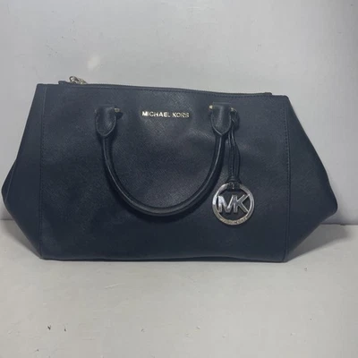 Cartera Michael Kors Sutton de cuero saffiano negro Foto 1 de 4